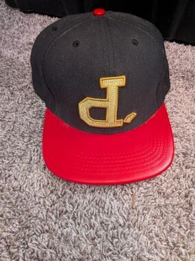 Black and Red Snapback Cap with Gold Embroidered Logo
